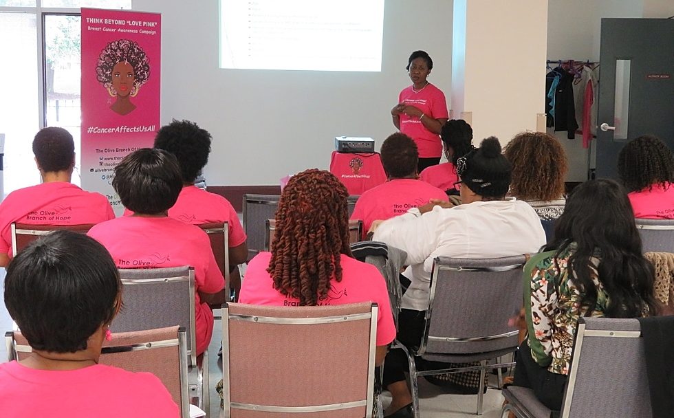 Blessing Bassey-Archibong – at one time a student in McMaster researcher Juliet Daniels' lab, and now a McMaster postdoctoral student – gives a breast cancer awareness talk at the inaugural Think Beyond Love Pink workshop in October 2016. The workshop, and others like it, are part of community partnership led by Daniel and Leila Springer of the Olive Branch of Hope, this year’s recipients of the President’s Award for Community Engaged research.