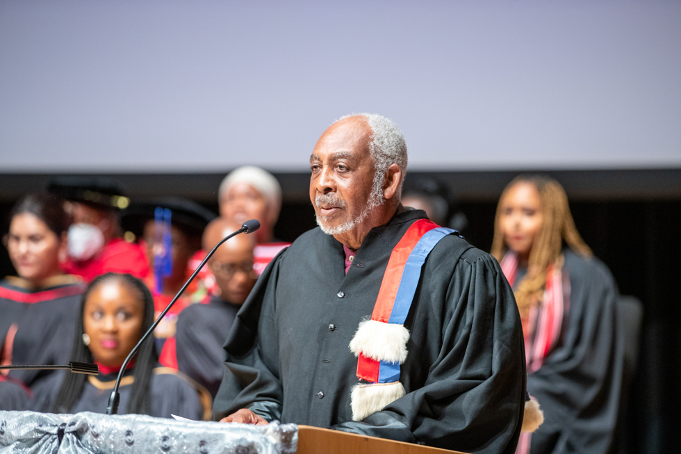 ACFAM co-founder and Professor Emeritus Gary Warner speaks at a convocation.